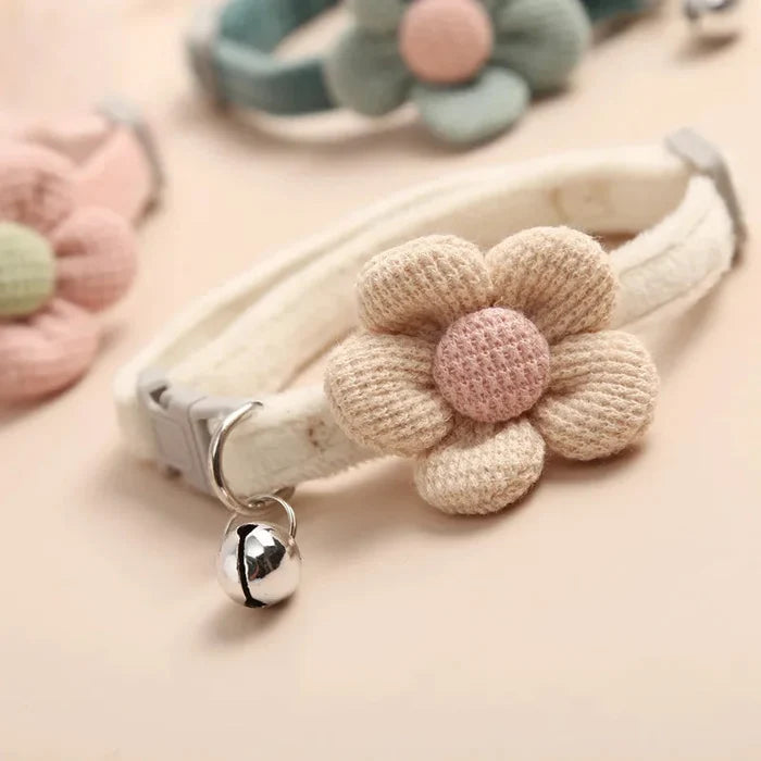 Adjustable cat collar in tan with crocheted flower and round bell charm