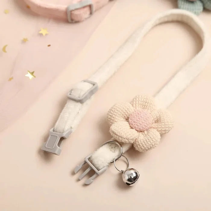 Adjustable cat collar in cream with pink flower applique and round bell charm