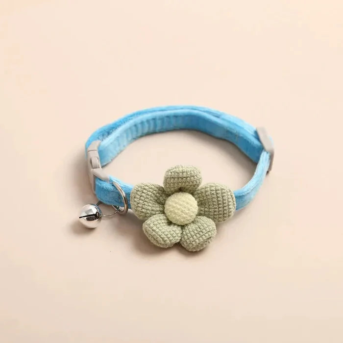 Adjustable pet cat collar in blue with crocheted green flower and round bell charm