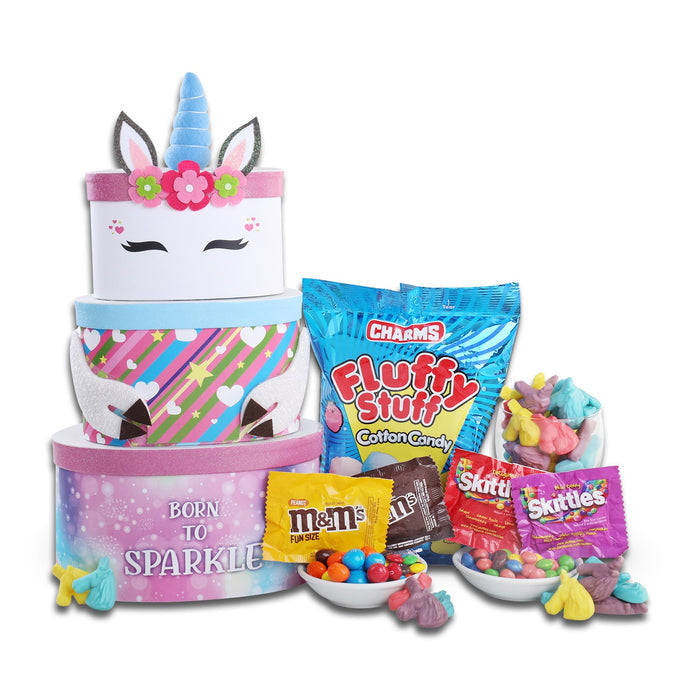 Unicorn gift tower front view with striped boxes, unicorn ears, candies and candy bowls