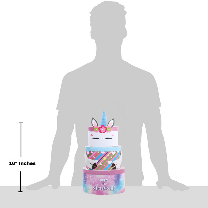 Unicorn gift tower height shown: about 16 in tall, held by standing figure silhouette