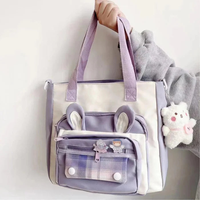 Purple bunny-ear tote shoulder bag with front plaid pocket and dangling plush charm