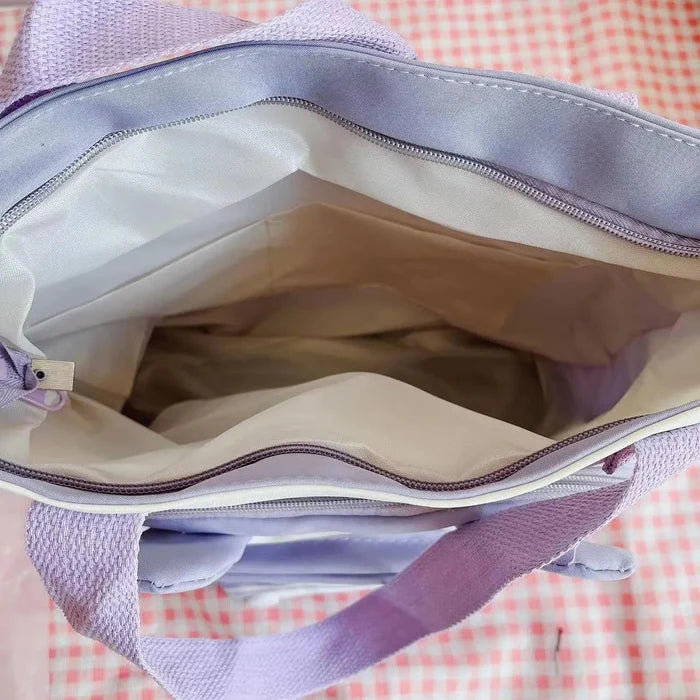 Lavender bunny-ear tote shoulder bag open interior with zipper closure and inner lining