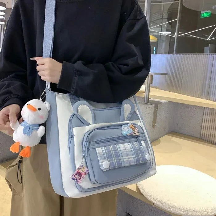 Light blue bunny-ear tote shoulder bag with front plaid pocket and mini zip pouch