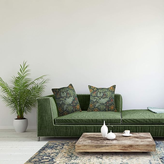 Square blue botanical tapestry pillow cover on sofa, multicolor floral jacquard pattern
