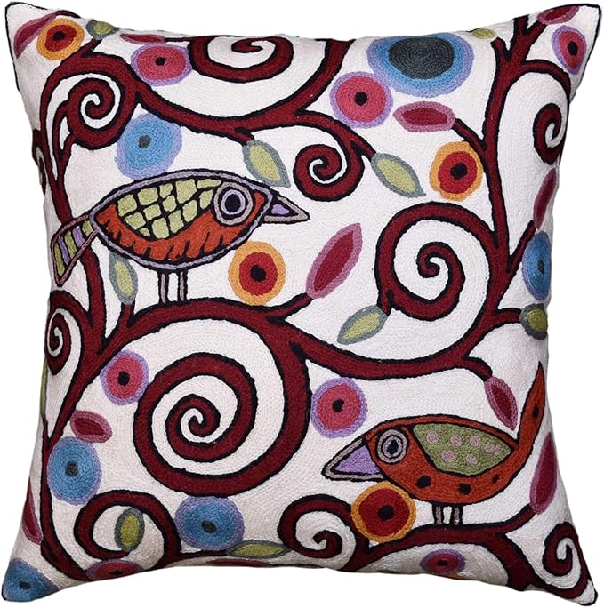 White embroidered decorative pillow cover with colorful birds and swirling motifs