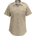 Product shot of a Flying Cross khaki women's short-sleeve uniform shirt featuring two chest pockets, a button-down front, and a neat collar  showing its subtle texture and the brand label
