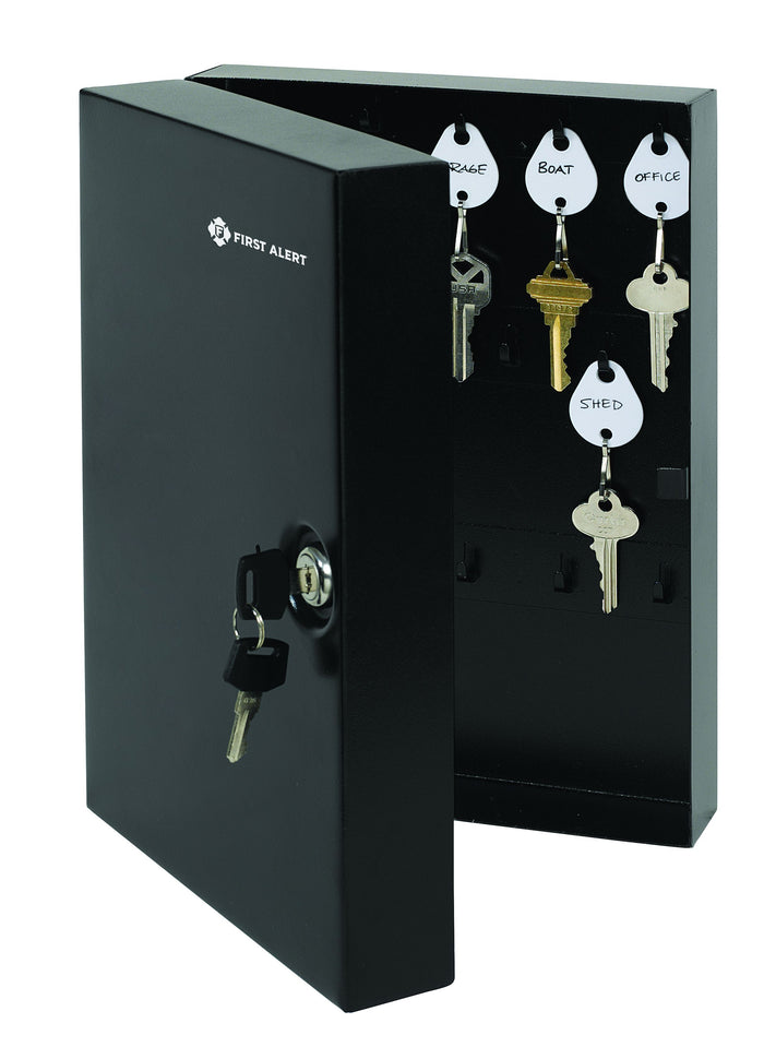 First Alert 28 Key Locking Security Cabinet, made from 18 gauge powder coated steel.  Comes complete with wall mount kit, 28 key hook and key rings and tags.           Model 3060F