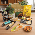 Game Day cutting board gift set with round bamboo board, snacks and herb garnish