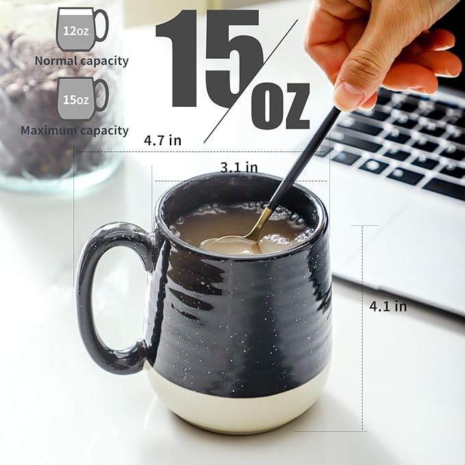 Ceramic coffee mug in dark speckled finish with handle and white interior