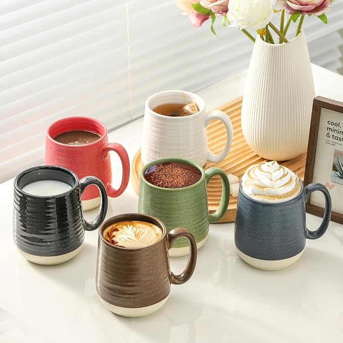 Ceramic coffee mug set with handles in black, red, green, brown, blue, and white