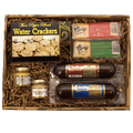 Wooden gift basket with water crackers, sausage, and cheese spread jars