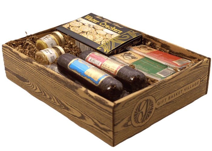 Wooden gift basket with crackers, sausage links, and packaged snack assortment
