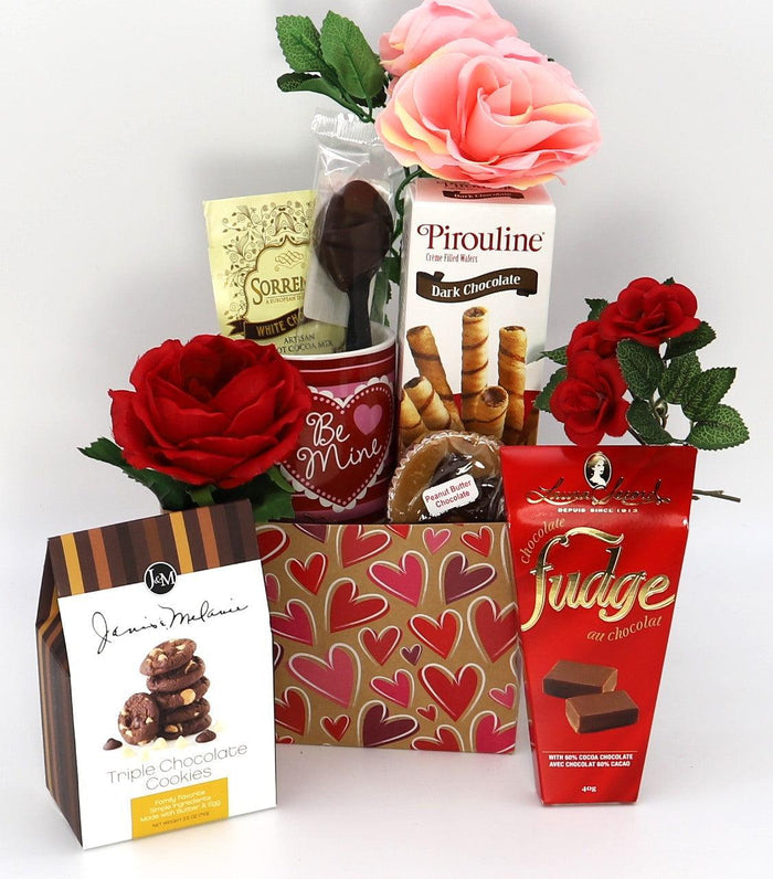 Heart-pattern gift box with red roses and assorted chocolates and cookies