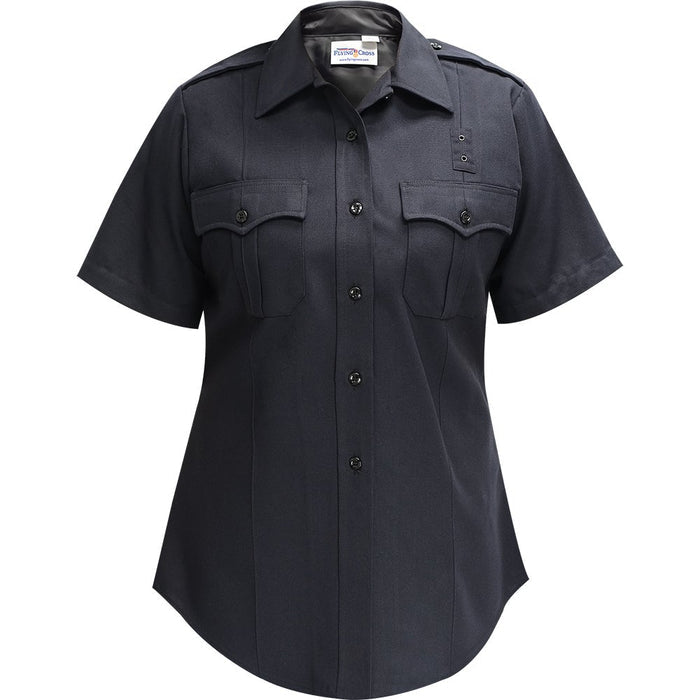 Product shot of a Flying Cross women's short-sleeve navy blue uniform shirt featuring two breast pockets, a button-down front, and a subtle sheen