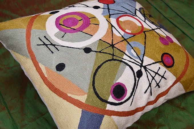 Wool throw pillow cover featuring colorful abstract circles on a cream ground.