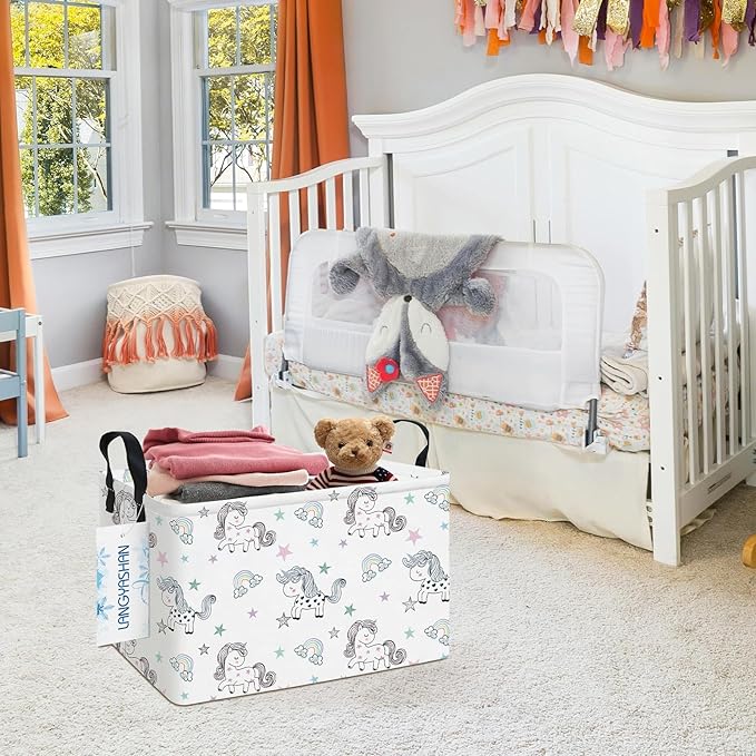Rectangular collapsible canvas storage bin with handles, white unicorn print, toys inside