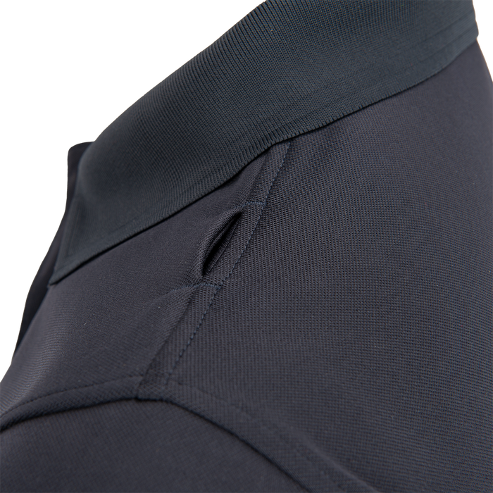 Close-up detail shot of a dark gray polo shirt collar showing a tightly woven fabric texture a reinforced neckband and a subtly contrasting stitch detail