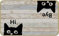 Grey cat welcome doormat with cartoon black cat faces, “Hi” and “Bye” text