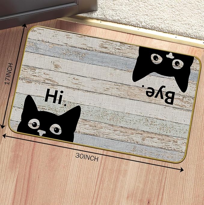 Grey cat welcome doormat showing cartoon black cat faces with “Hi” and “Bye”