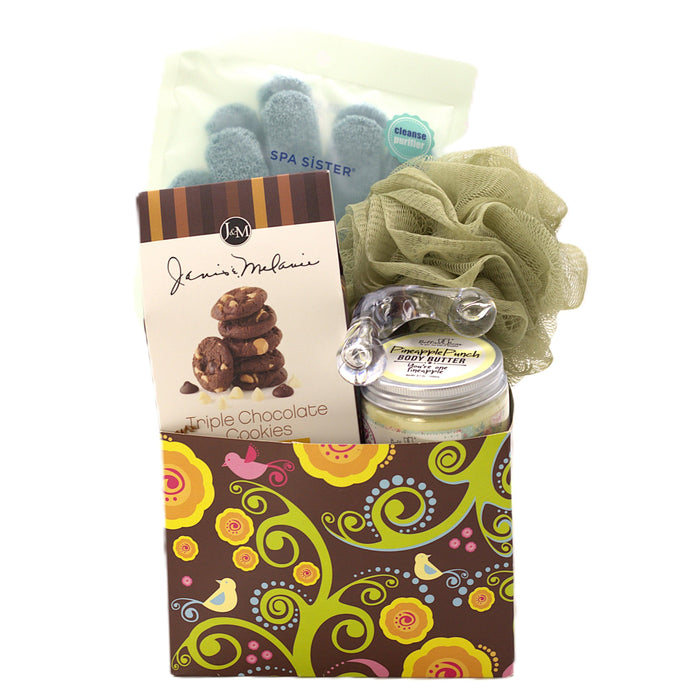 Spa gift set with cookie box, body butter jar, patterned gift bag, and sage washcloth