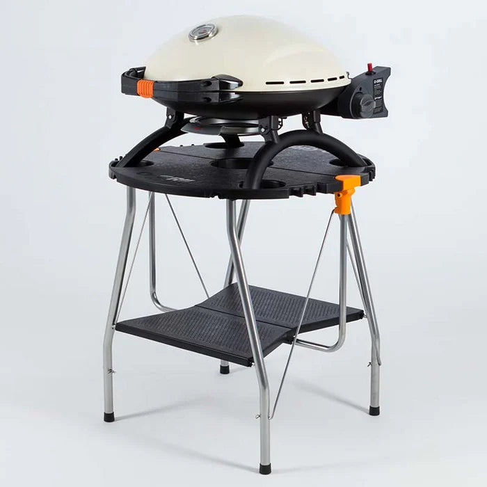 An o-dock holding up a cream o-grill 900 against a white background