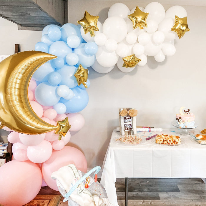 Blue and white latex balloon cluster with gold star and moon foil balloons