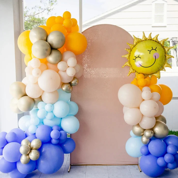 Balloon arch with blue, white, and gold latex balloon clusters, glossy finish