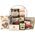 Christmas gift basket with assorted chocolates, wafers, truffles, and coffee drinks