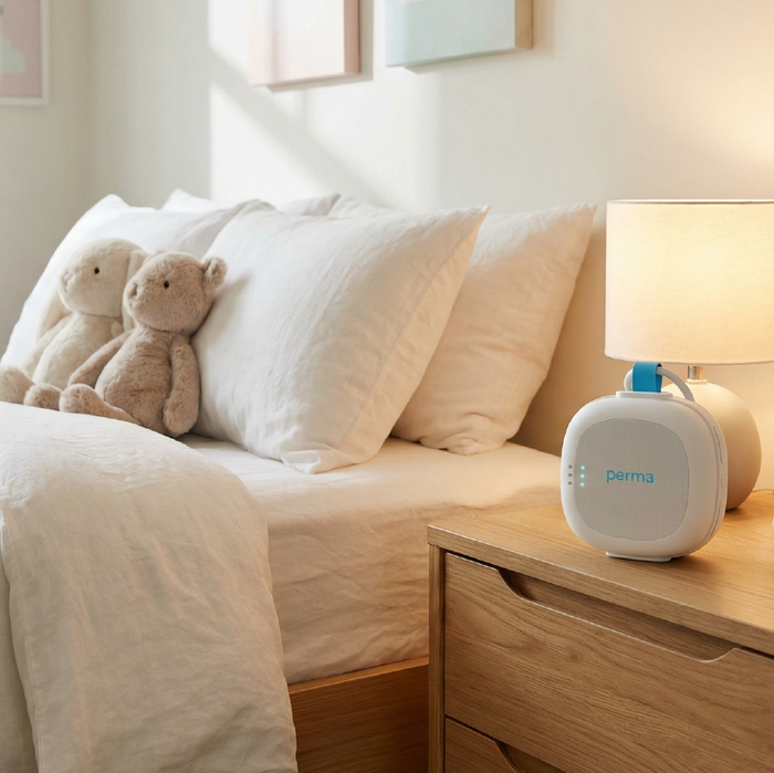 SOUND MACHIEN ON KIDS BEDSIDE TABLE