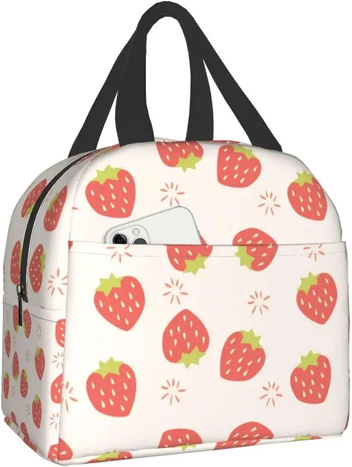 White strawberry pattern insulated lunch bag with black carry handles