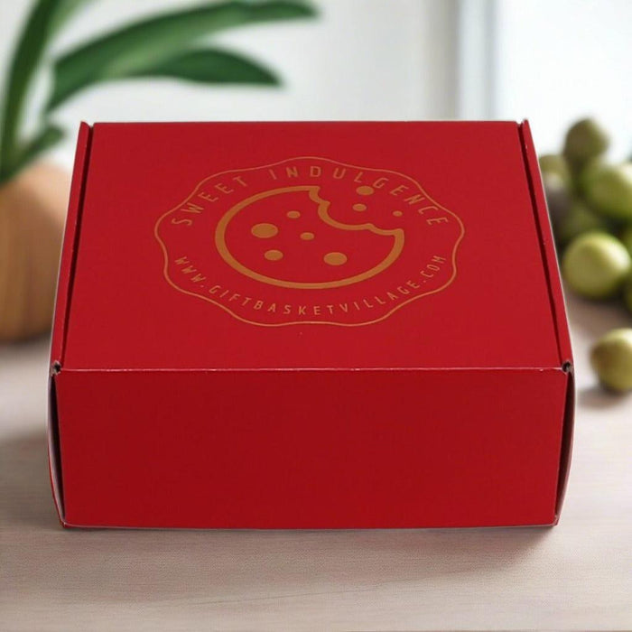 Sweet Indulgence red gift box with gold logo on the lid