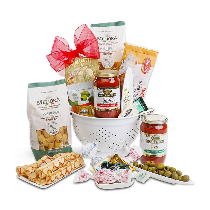 Pasta gift basket with white basket, pasta bags, marinara jars, olives, crackers and cookies