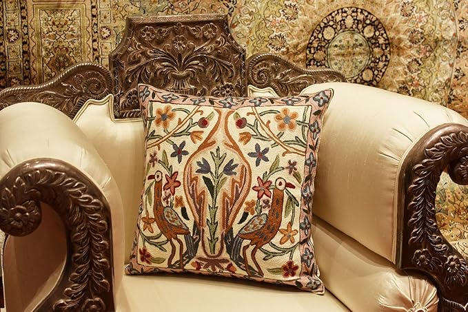 Cream cushion cover with colorful bird and floral needlework, square front
