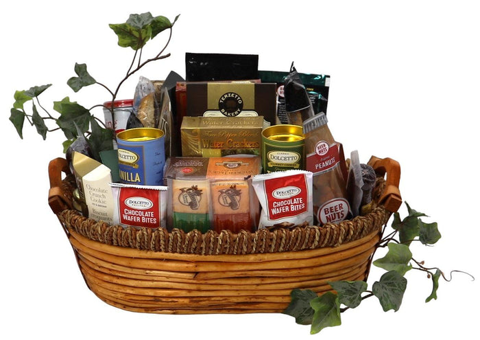 Wicker gift basket with assorted treats, including tins, cookies, crackers, and nuts.
